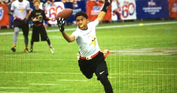 Youth flag football teams win NFL FLAG titles at Super Bowl XLIX